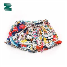 شورت منسوج من الكتان بطبعة كشكش مع حزام فيونكة